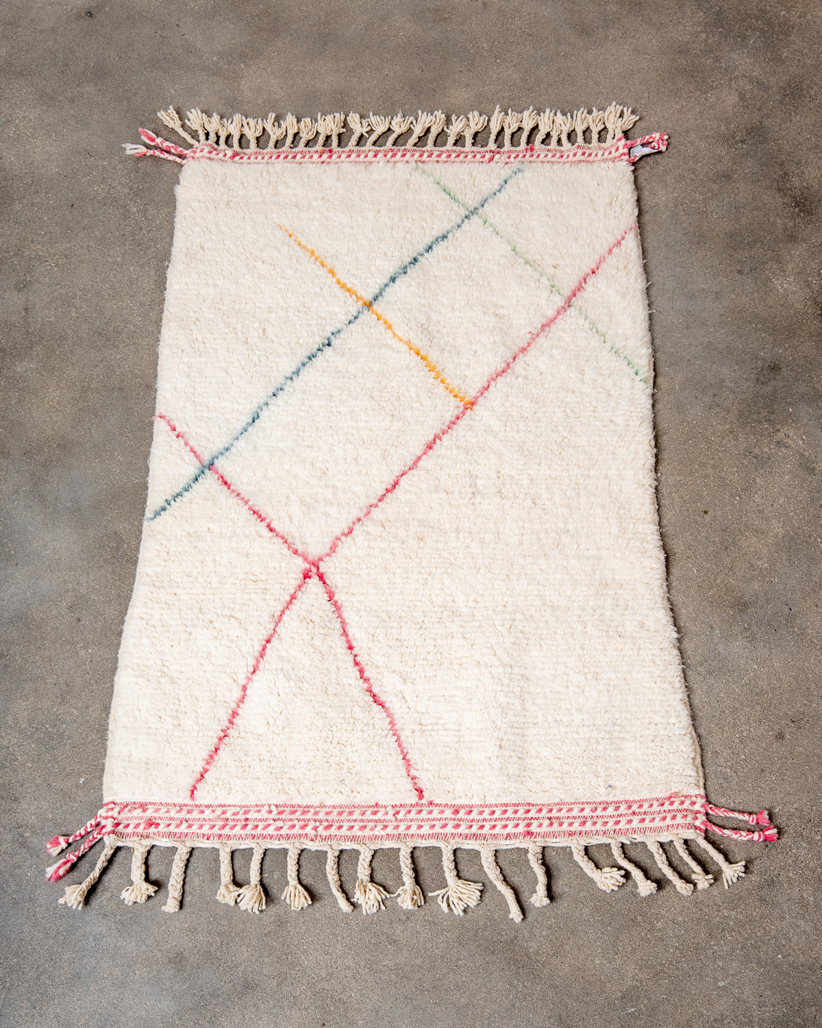 Modern, designer, handcrafted Berber rug from Morocco. Beniourain carpet with beautiful colours and patterns and fluffy wool texture.